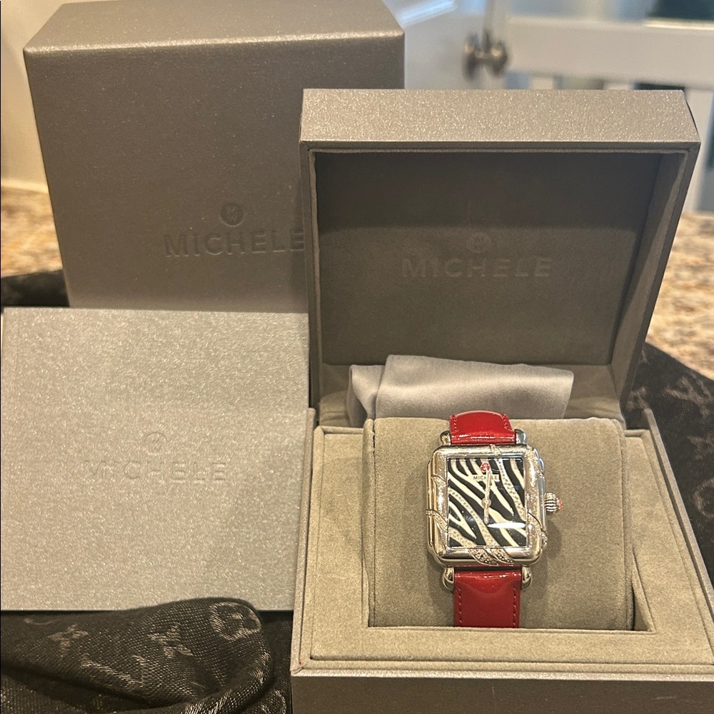 Michele Zebra Dial Watch with diamonds inside and out, red strap silver case.